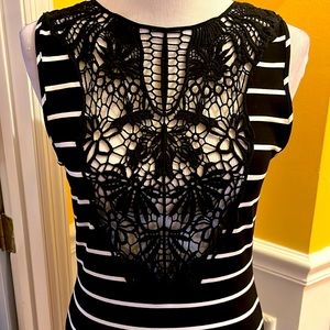 Black maxi dress with white stripes. Crochet front and shoulders v-neck back